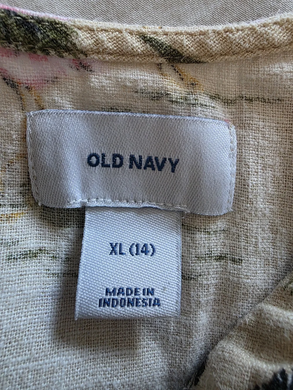 Old Navy Beige Jungle Print Sleeveless Romper with Yellow Accents.